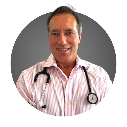 Gastroesophageal Reflux Disease (GERD), image of Dr. Michael Rothman wearing a black stethoscope around his neck over a white button down shirt.